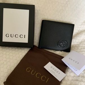 Gucci embossed gg wallet
